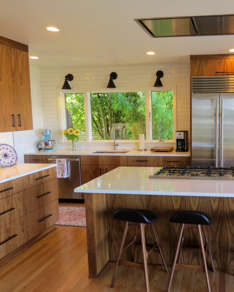 Cozy modern kitchen with walnut wood cabinets